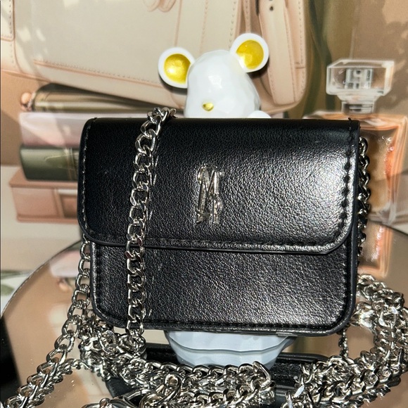 Steve Madden Handbags - Steve Madden Black Mini Bag with Silver Chain Good Condition